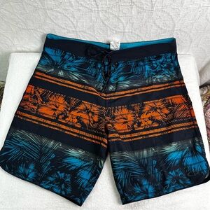Oakley Swim Trunks Mens 36 Surf Shorts Slim Fit Tropical Print Orange Blue Light